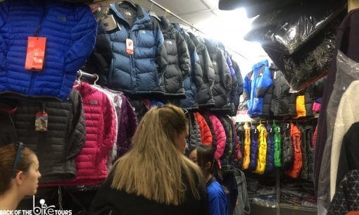 Northface Jackets hung on the wall in Saigon Square, Ho Chi Minh City